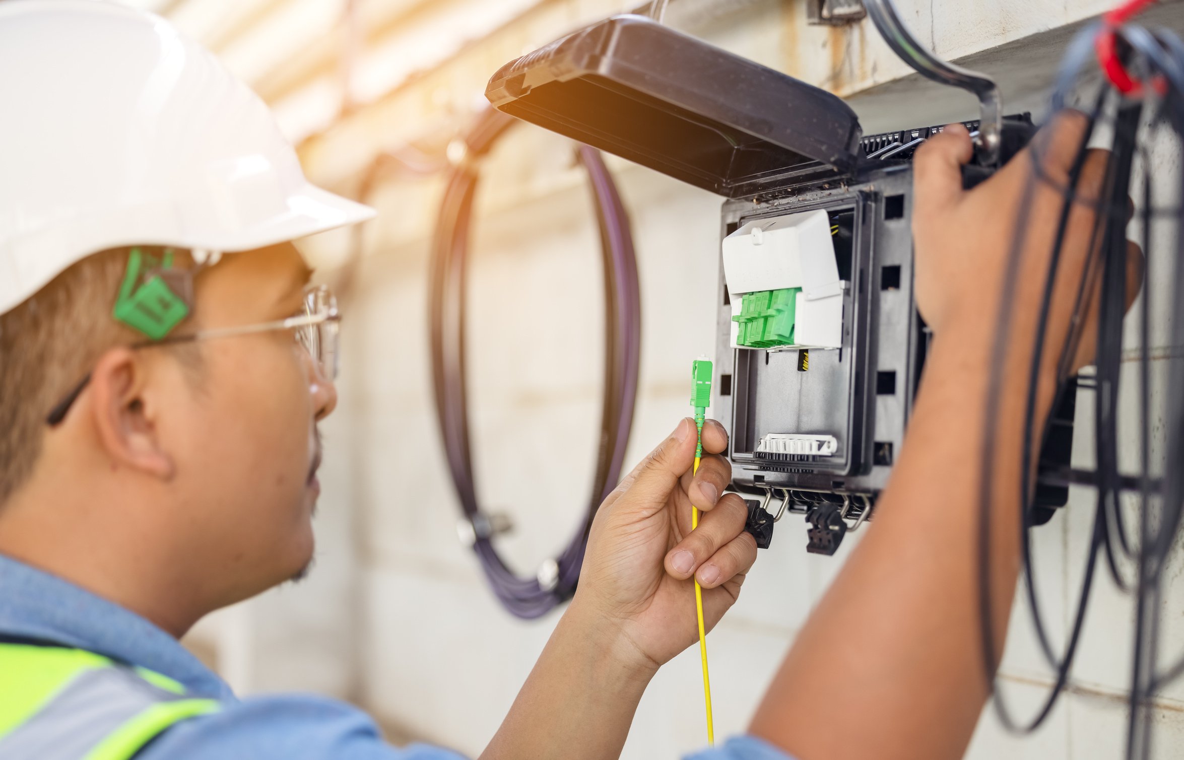 An Internet Technician Is Repairing or Maintaining a Fiber Optic