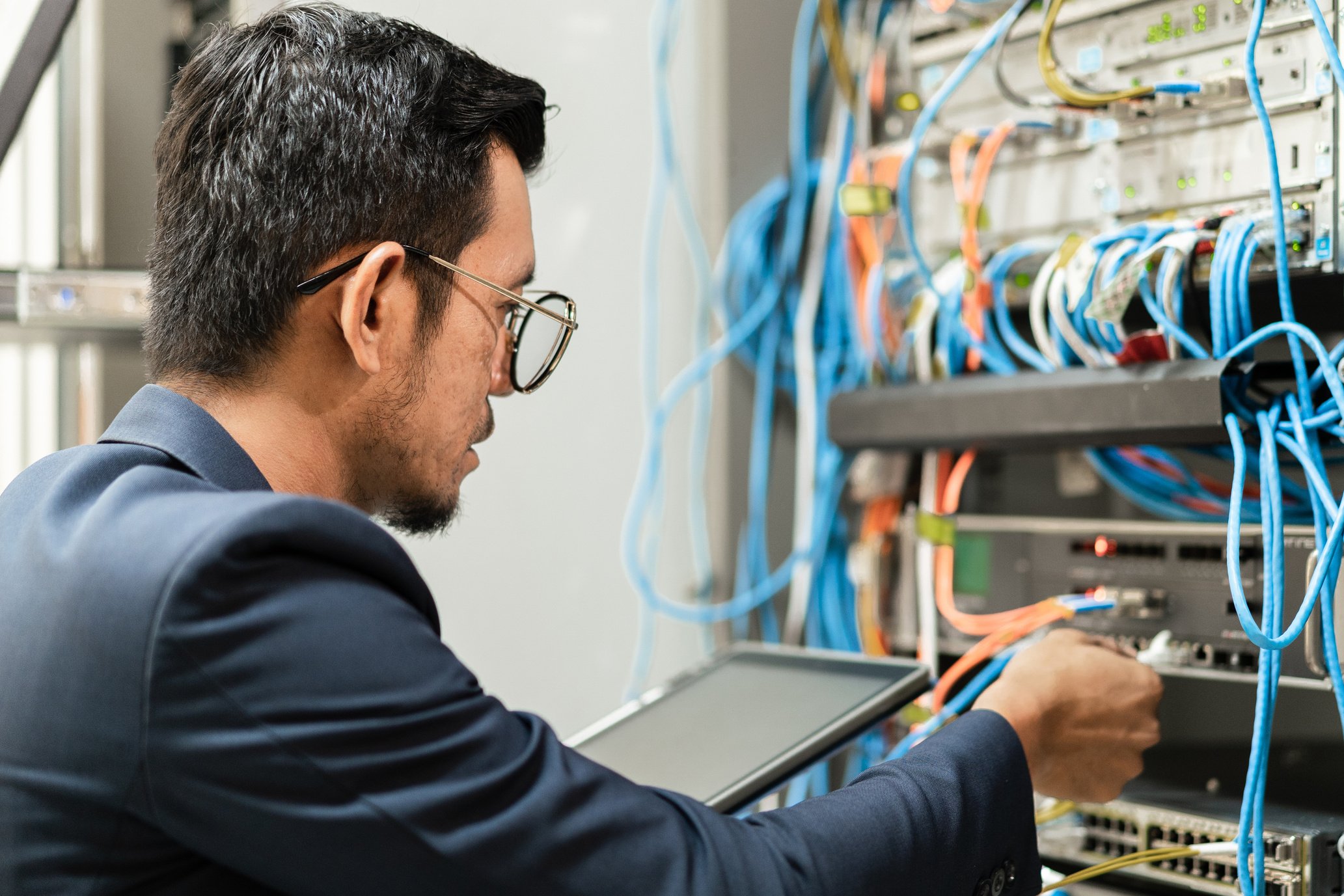  Computer Technician Connecting Network Cables